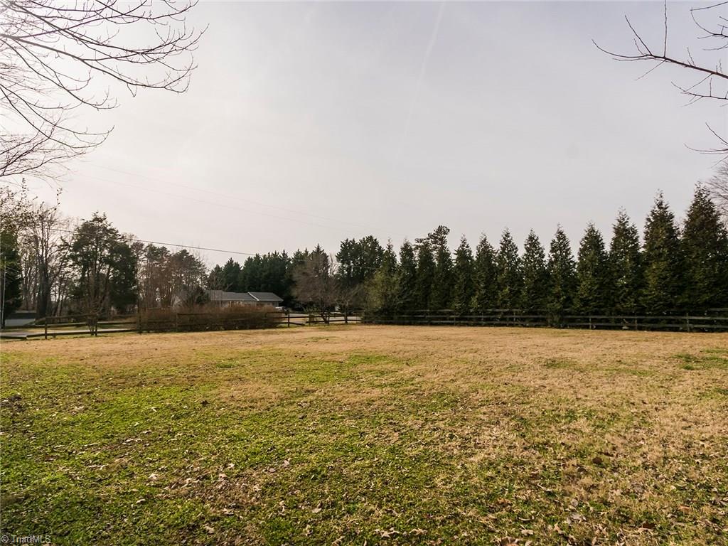 8564 Benbow-Merrill Road Oak Ridge, NC 27310 - Photo 16 of 20 LG Pasture right beside of home.
