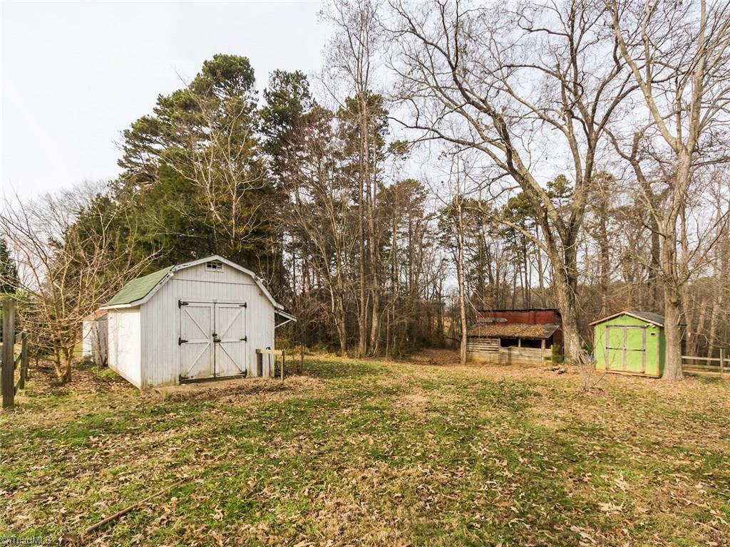 8564 Benbow-Merrill Road Oak Ridge, NC 27310 - Photo 17 of 20 Storage buildings on property.