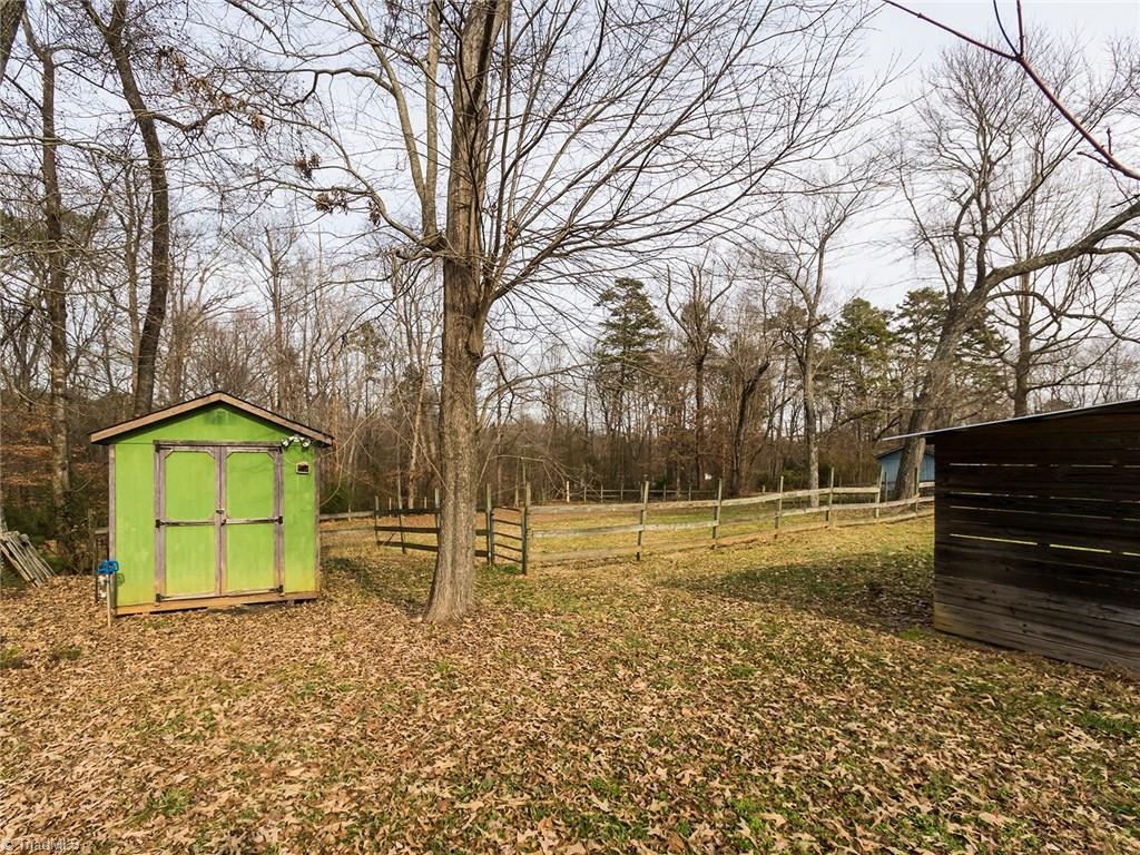 8564 Benbow-Merrill Road Oak Ridge, NC 27310 - Photo 18 of 20 Fenced in area at back of property.