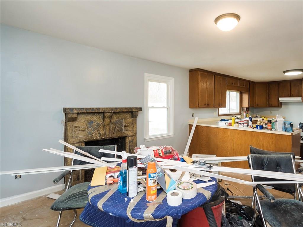 8564 Benbow-Merrill Road Oak Ridge, NC 27310 - Photo 8 of 20 Living room is open to the kitchen!