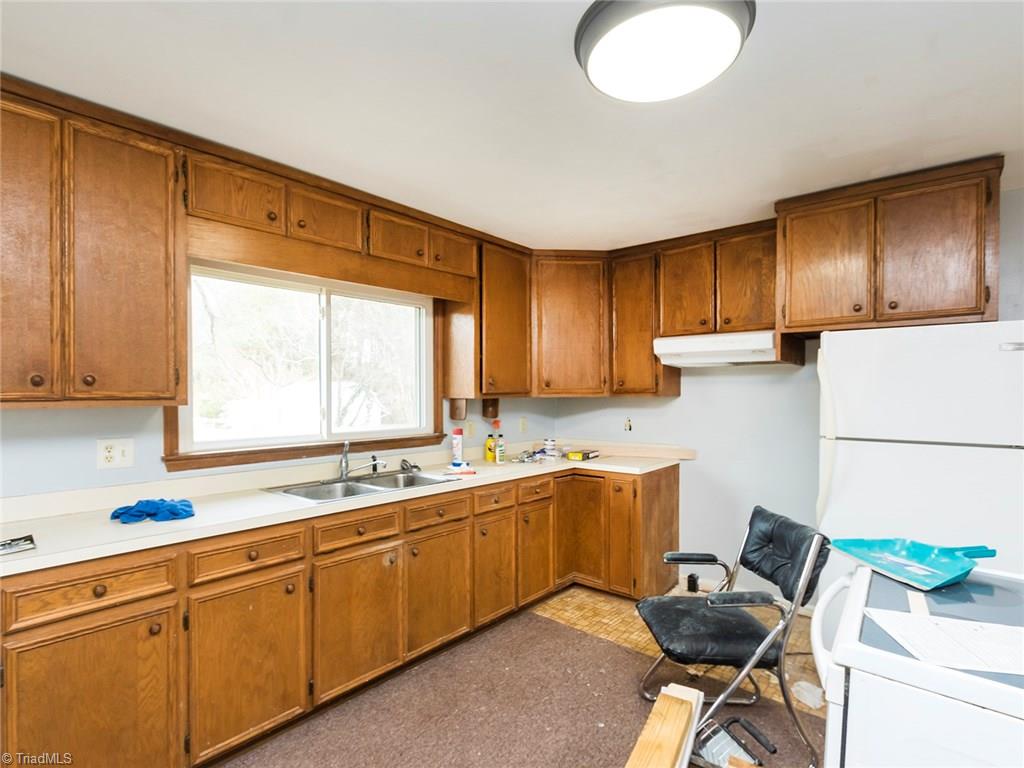 8564 Benbow-Merrill Road Oak Ridge, NC 27310 - Photo 10 of 20 Lg kitchen with great cabinet and counter space!
