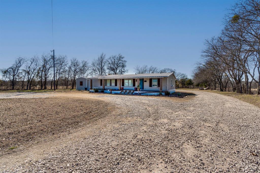 3444 East E Highway Midlothian, TX 76065 - Photo 25 of 26 a view of house with outdoor space and sitting area