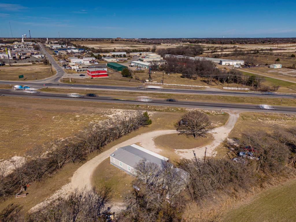 3444 East E Highway Midlothian, TX 76065 - Photo 8 of 26 a bathroom with a sink and a mirror