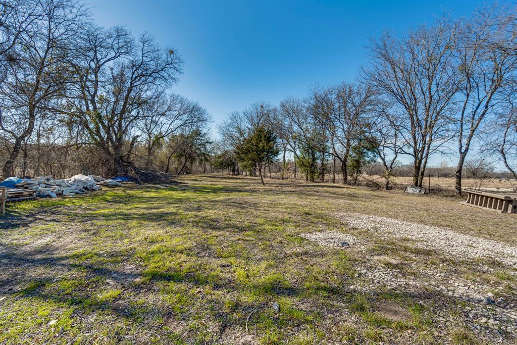 3444 East E Highway Midlothian, TX 76065 - Photo 9 of 26 a view of outdoor space with trees