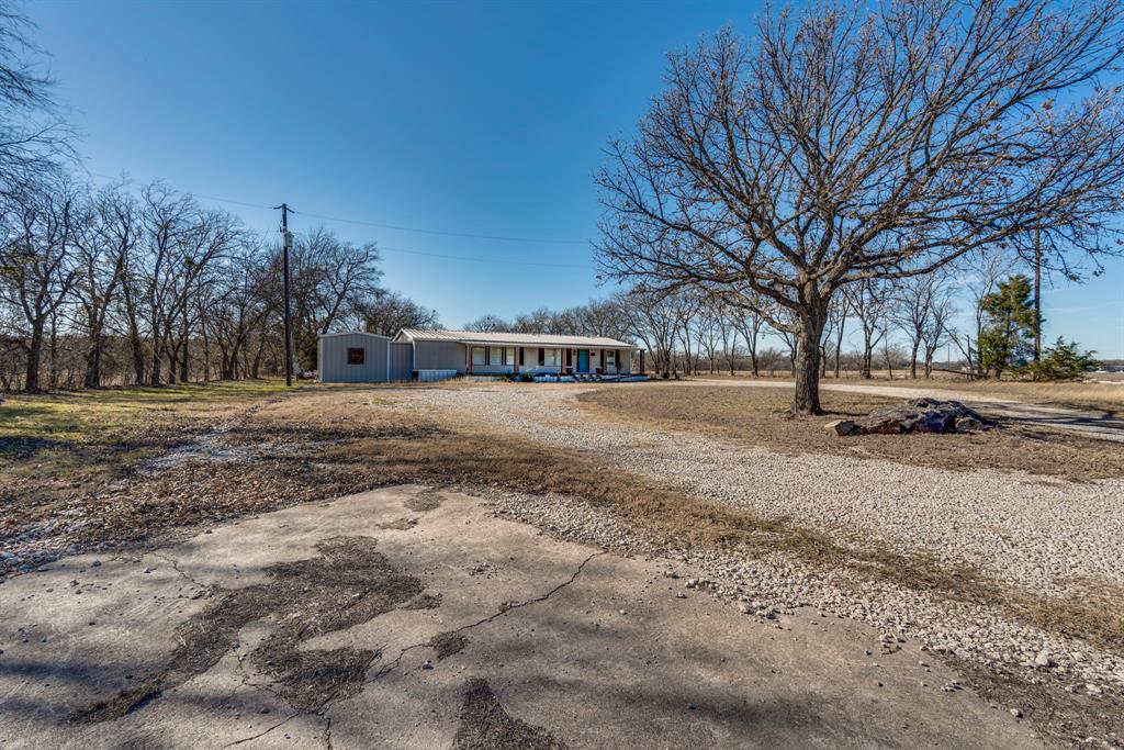3444 East E Highway Midlothian, TX 76065 - Photo 10 of 26 a view of road with trees