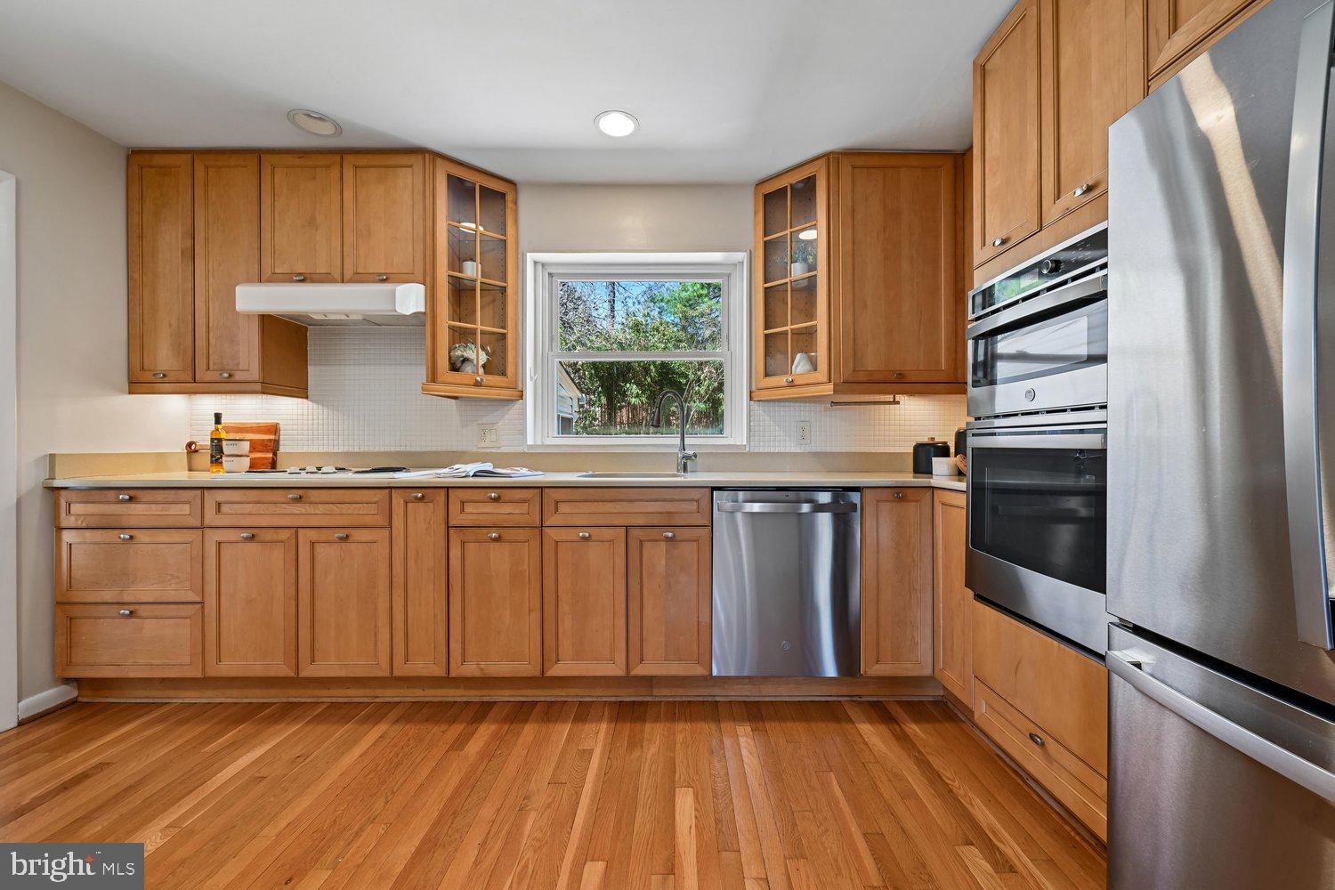 10706 Stoneyhill Drive Silver Spring, MD 20901 - Photo 12 of 49 Kitchen w/ updated backsplash