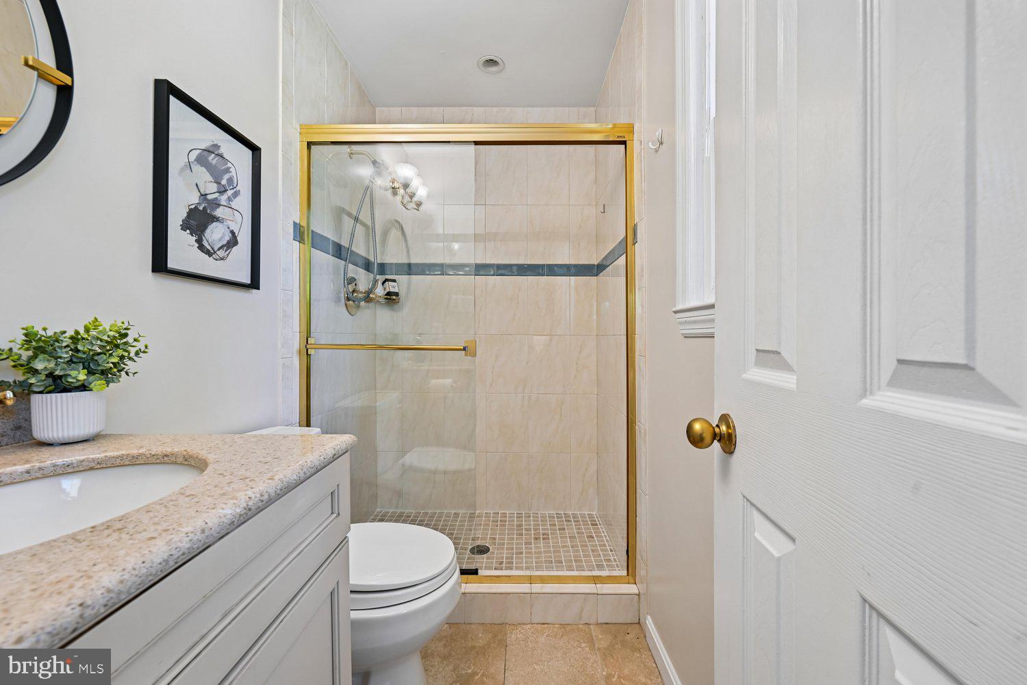 10706 Stoneyhill Drive Silver Spring, MD 20901 - Photo 28 of 49 Primary en suite w/ glass enclosed shower