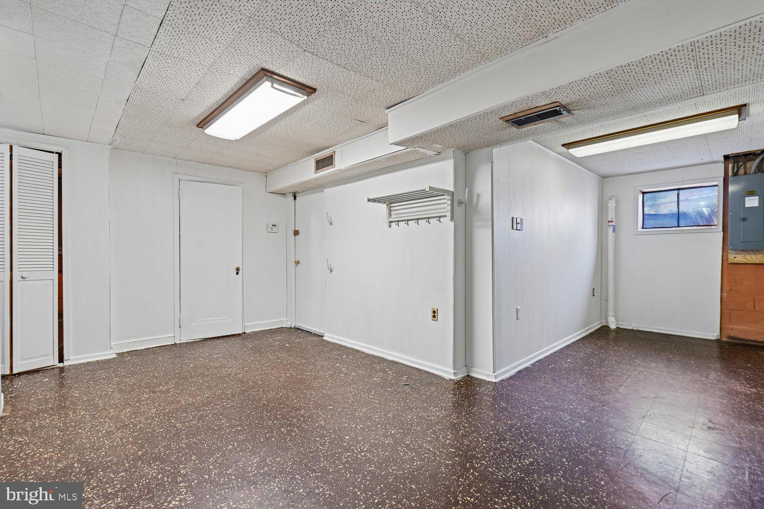 10706 Stoneyhill Drive Silver Spring, MD 20901 - Photo 42 of 49 Laundry room w/ garage access & storage room