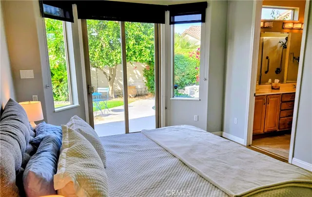 a workspace with wooden floor and a window