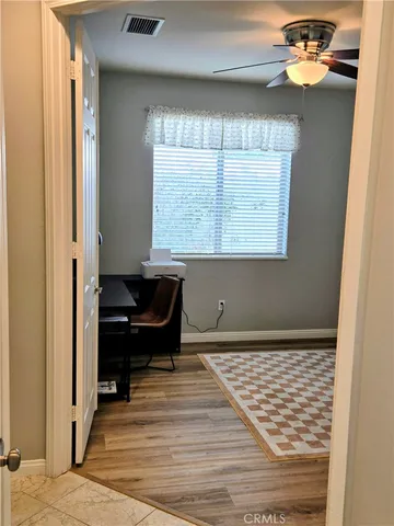 a bathroom with a granite countertop toilet sink and shower