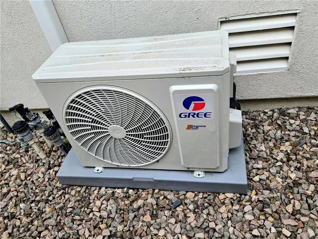a table and chairs in a garden