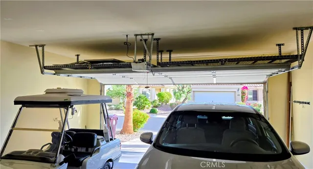 a view of a backyard with potted plants