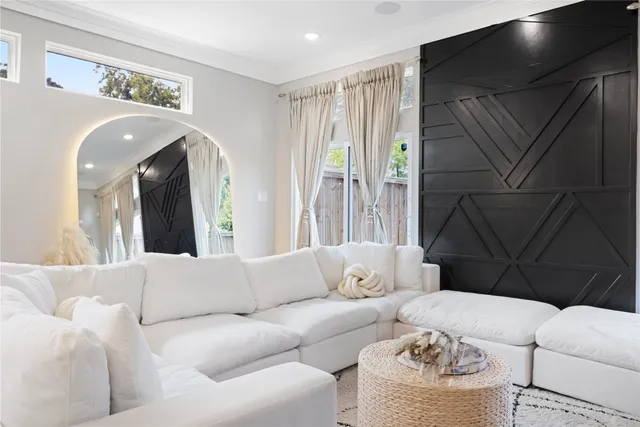 a living room with furniture and a couch