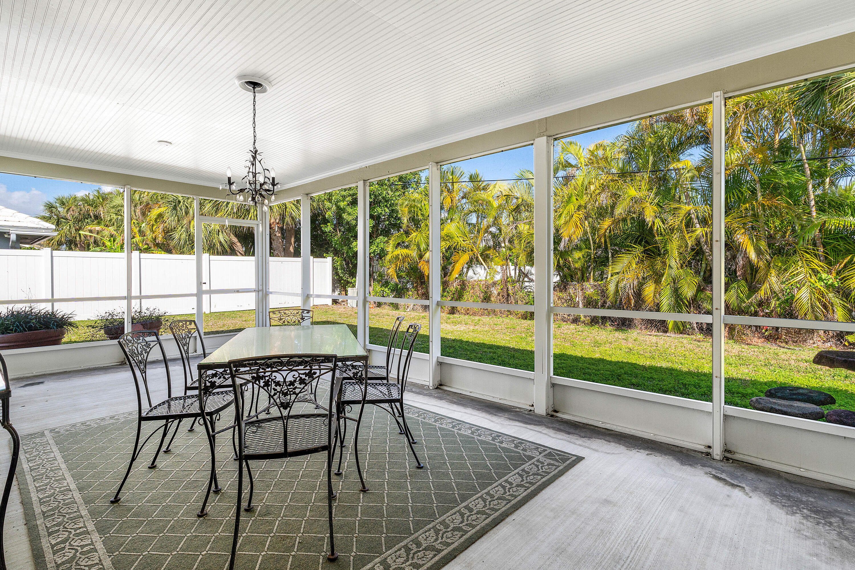 1210 Dolphin Road Singer Island, FL 33404 - Photo 29 of 41 a dining room with furniture and garden view