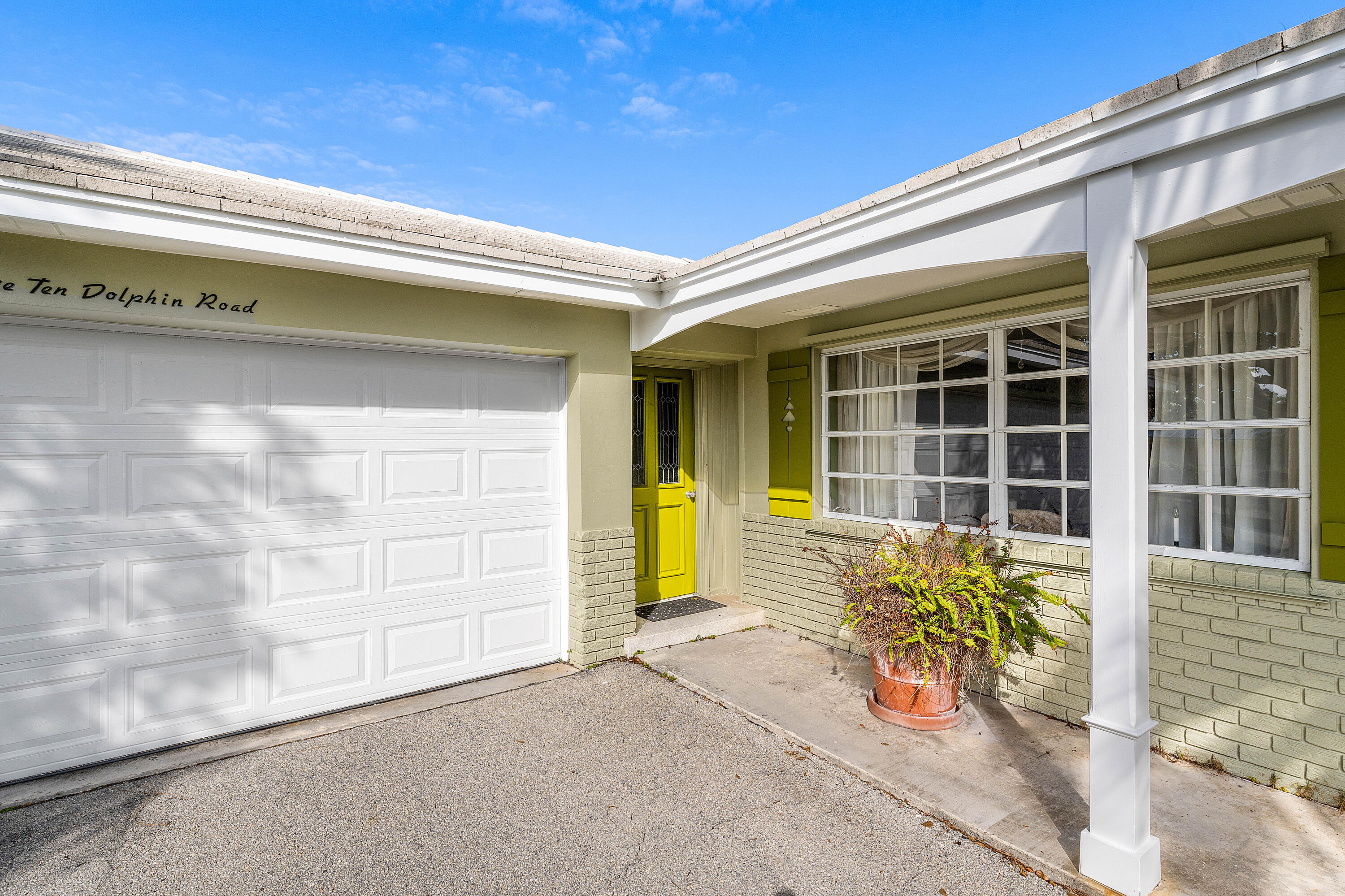 1210 Dolphin Road Singer Island, FL 33404 - Photo 8 of 41 a front view of a building