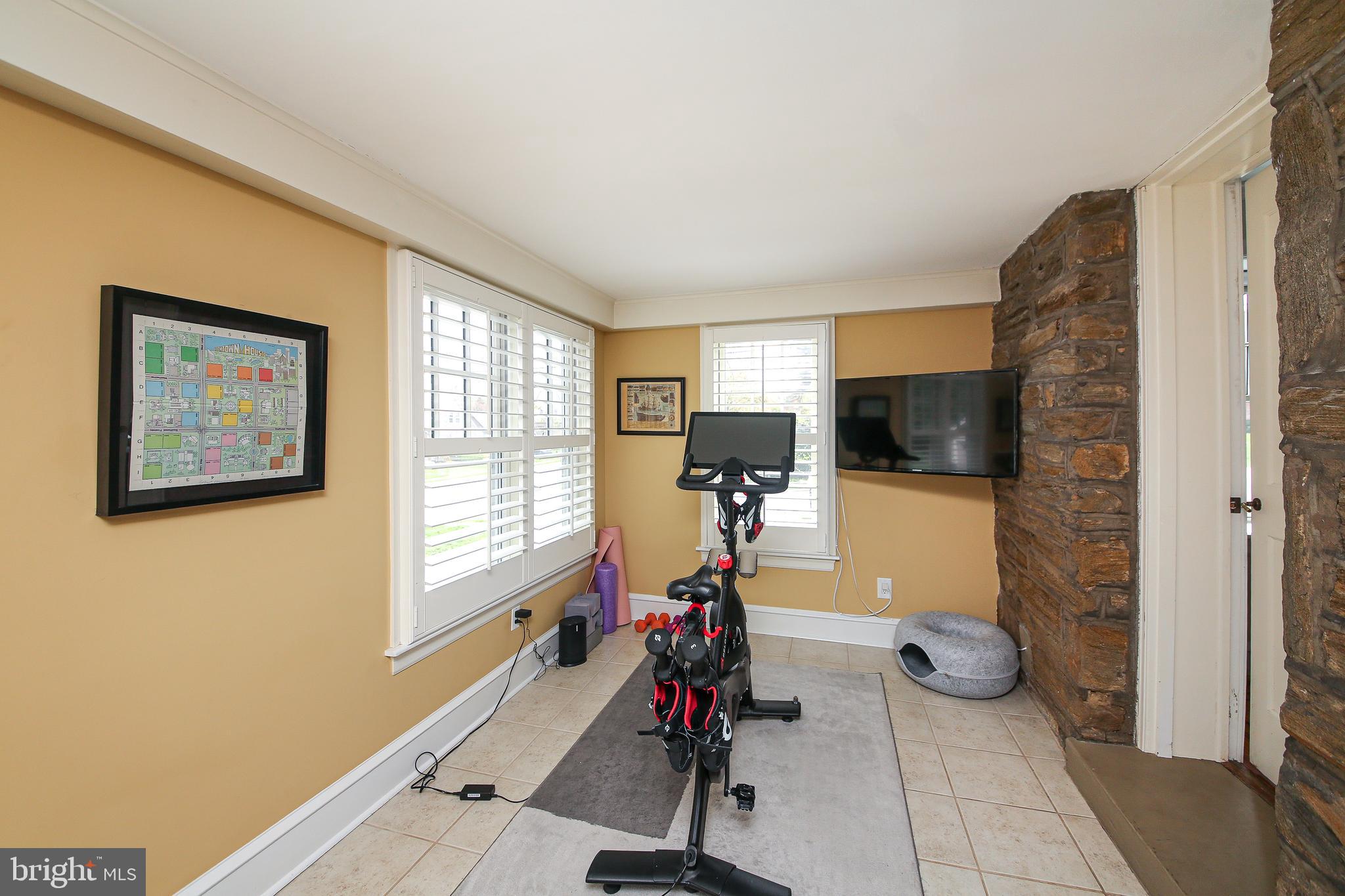 20 Hillside Road Wayne, PA 19087 - Photo 17 of 49 Sunroom with stone wall