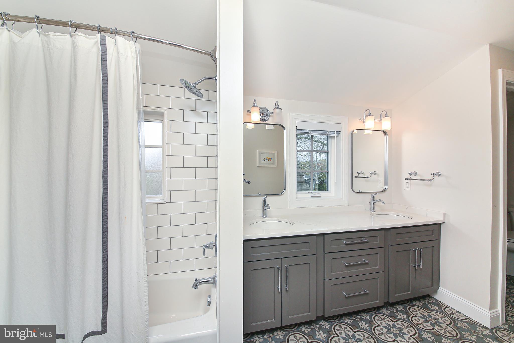 20 Hillside Road Wayne, PA 19087 - Photo 29 of 49 Jack-n-Jill bath has 2 sinks, tub & radiant floor