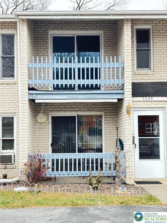 1323 South Howard Street, Unit 2 Allentown, PA 18103 - Photo 1 of 19 a front view of a house with a yard