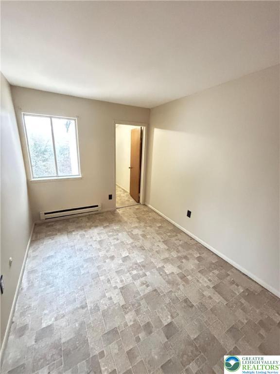 1323 South Howard Street, Unit 2 Allentown, PA 18103 - Photo 11 of 19 an empty room with windows