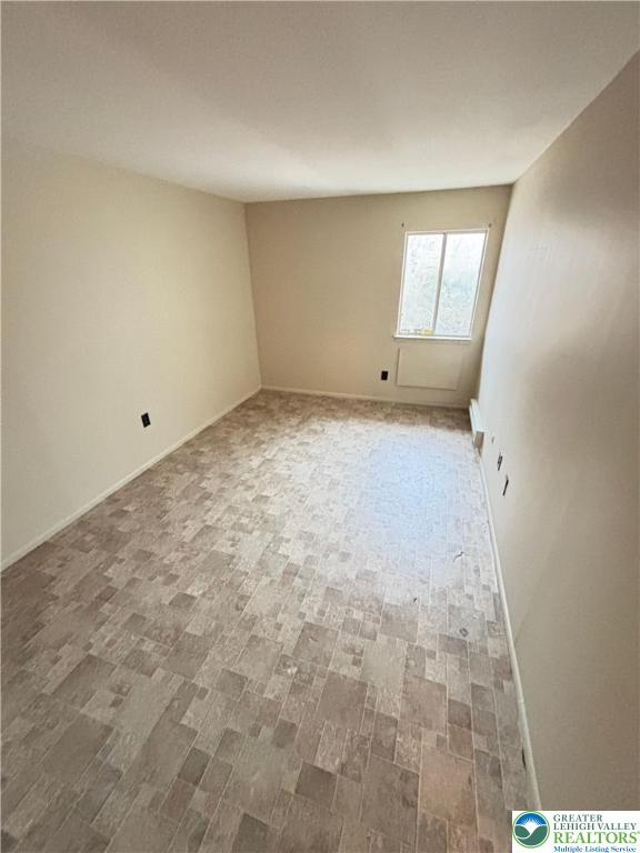 1323 South Howard Street, Unit 2 Allentown, PA 18103 - Photo 15 of 19 en empty room with windows