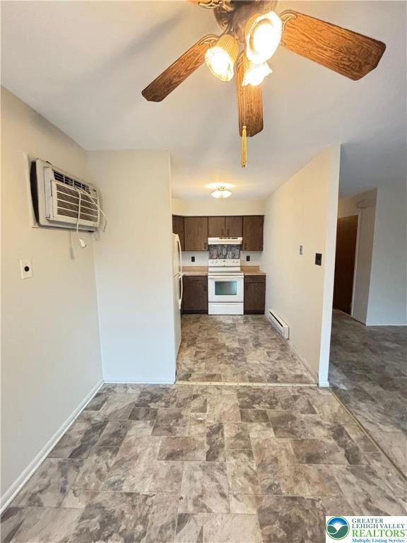 1323 South Howard Street, Unit 2 Allentown, PA 18103 - Photo 6 of 19 a view of a kitchen with a sink and a refrigerator