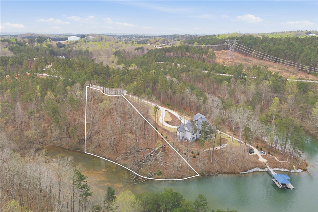 154 Bailey Street Six Mile, SC 29682 - Photo 13 of 22 This tranquil waterfront property offers privacy and serene views, perfect for a peaceful retreat.