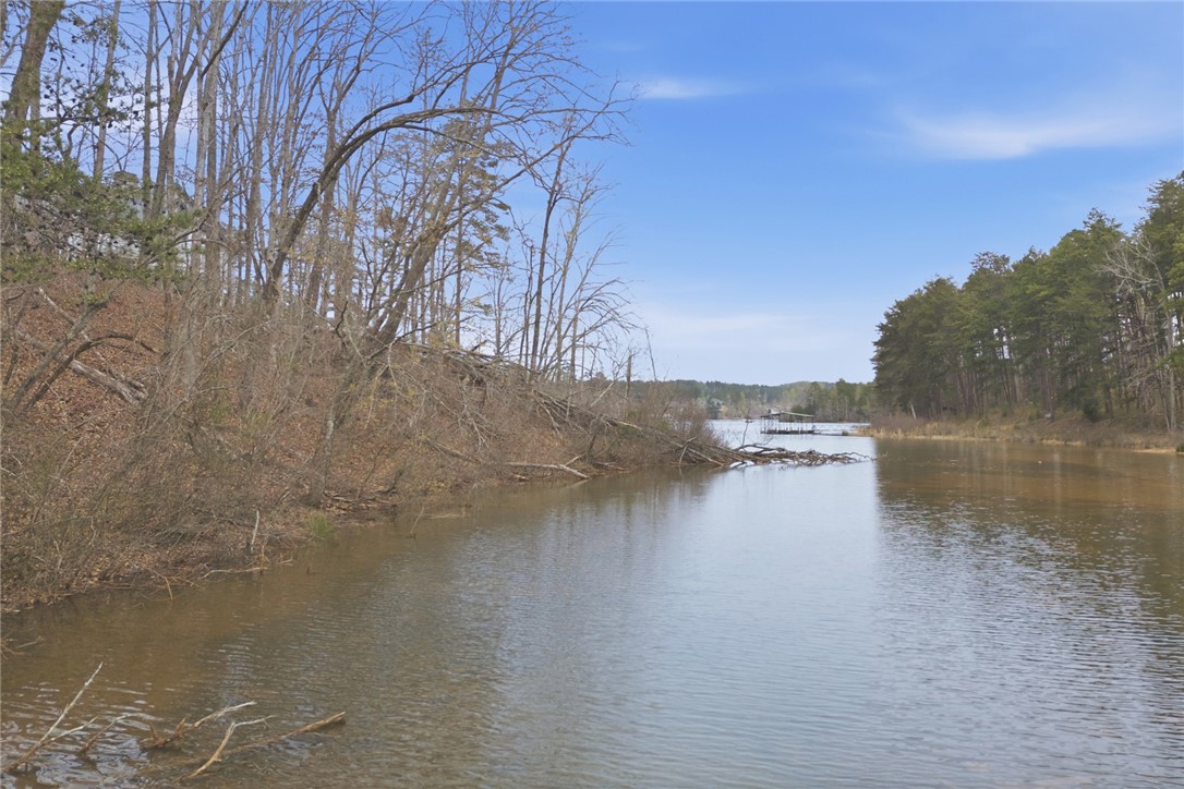 154 Bailey Street Six Mile, SC 29682 - Photo 17 of 22 This serene waterfront lot offers tranquil lake views, ideal for your private retreat.