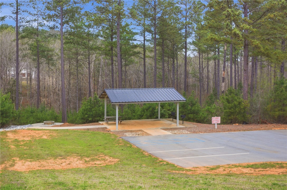 154 Bailey Street Six Mile, SC 29682 - Photo 8 of 22 Enjoy outdoor gatherings under the covered pavilion, surrounded by natural woodlands and convenient parking.