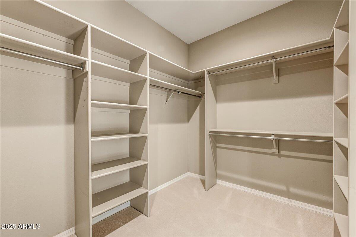 27002 North Agua Verde Drive Rio Verde, AZ 85263 - Photo 20 of 28 a view of an empty walk in closet