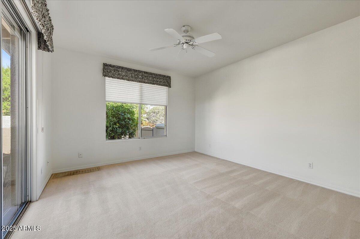 27002 North Agua Verde Drive Rio Verde, AZ 85263 - Photo 21 of 28 an empty room with a window