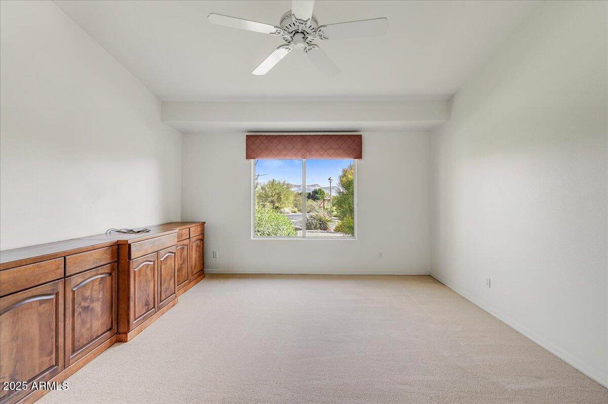 27002 North Agua Verde Drive Rio Verde, AZ 85263 - Photo 23 of 28 an empty room with windows