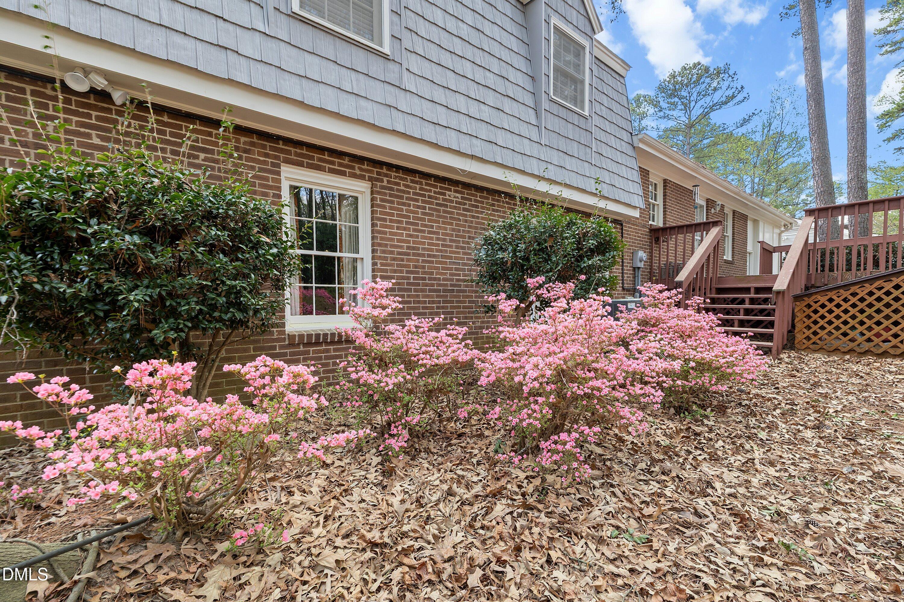 1429 Falls Church Road Raleigh, NC 27609 - Photo 50 of 60 a front view of a house with garden