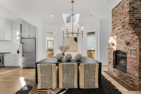 a kitchen with a stove and cabinets