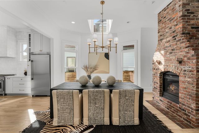 a kitchen with a stove and cabinets