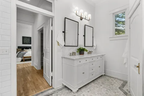 a view of a livingroom with furniture and windows