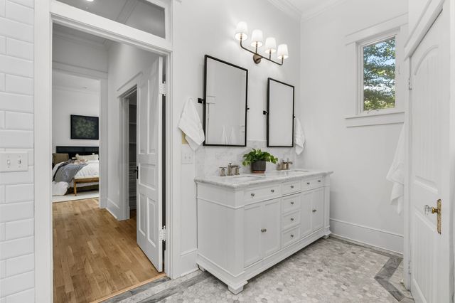 a view of a livingroom with furniture and windows