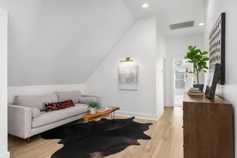a view of balcony with wooden floor and outdoor space