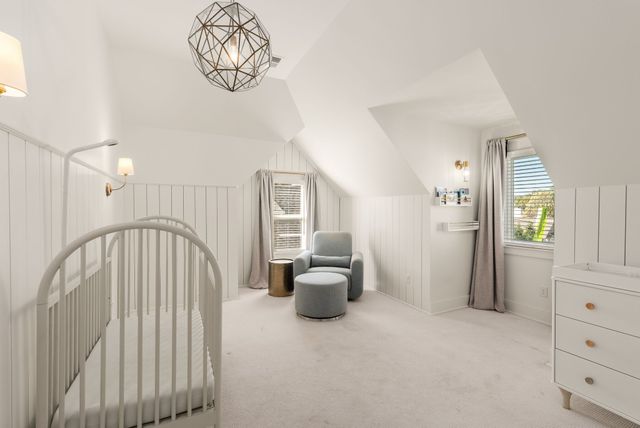 an aerial view of residential house with outdoor space and swimming pool