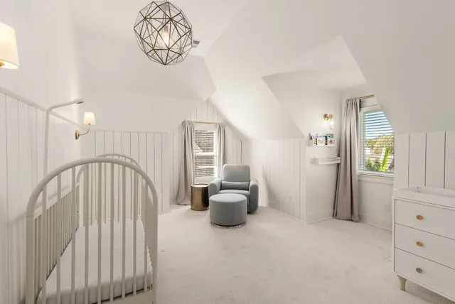 an aerial view of residential house with outdoor space and swimming pool