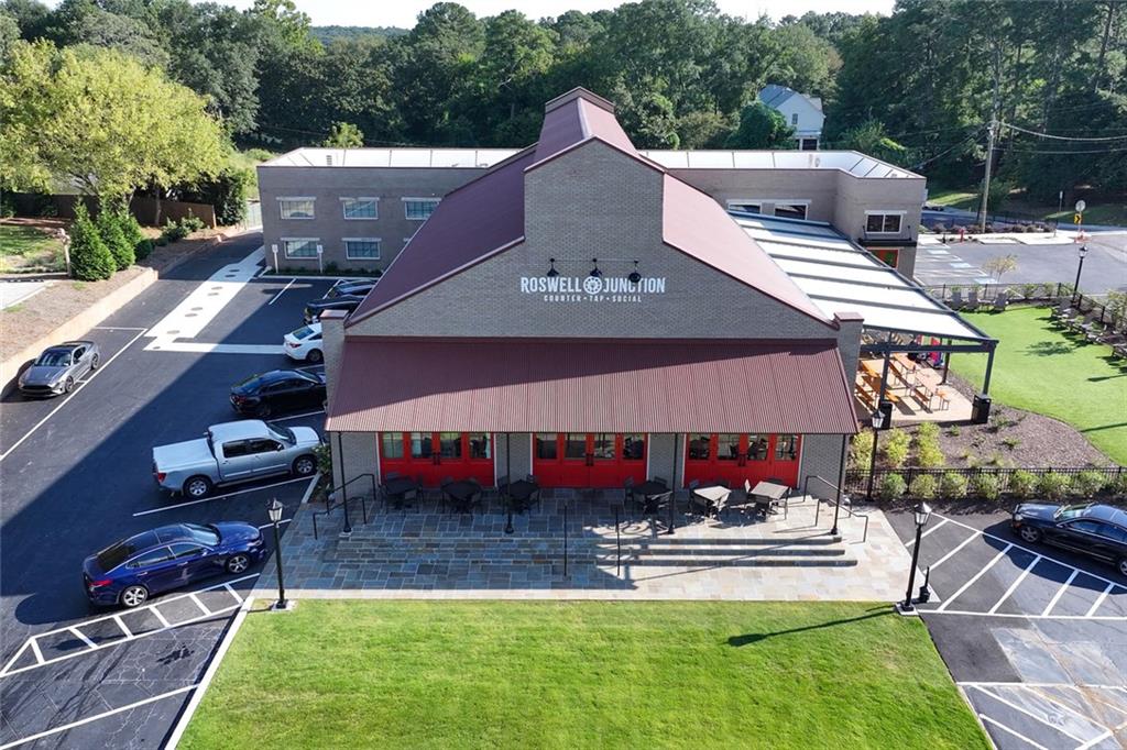 383 Westside Drive Roswell, GA 30075 - Photo 20 of 28 a view of a house with swimming pool and sitting area