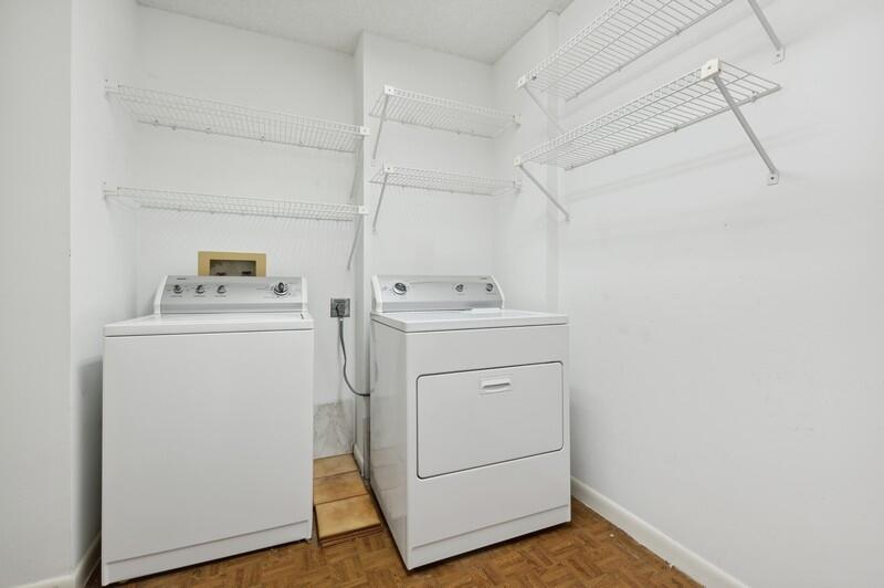 15074 Witney Road, Unit C101 Delray Beach, FL 33484 - Photo 17 of 25 14_15074WitneyRd_Unit101_44_LaundryRoom_