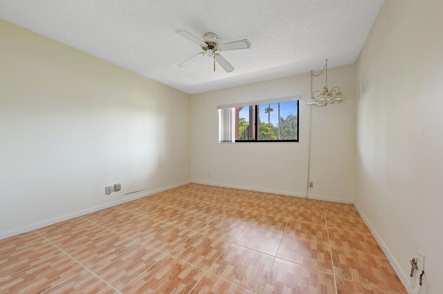 15074 Witney Road, Unit C101 Delray Beach, FL 33484 - Photo 10 of 25 17_15074WitneyRd_Unit101_153_2ndBedroom_