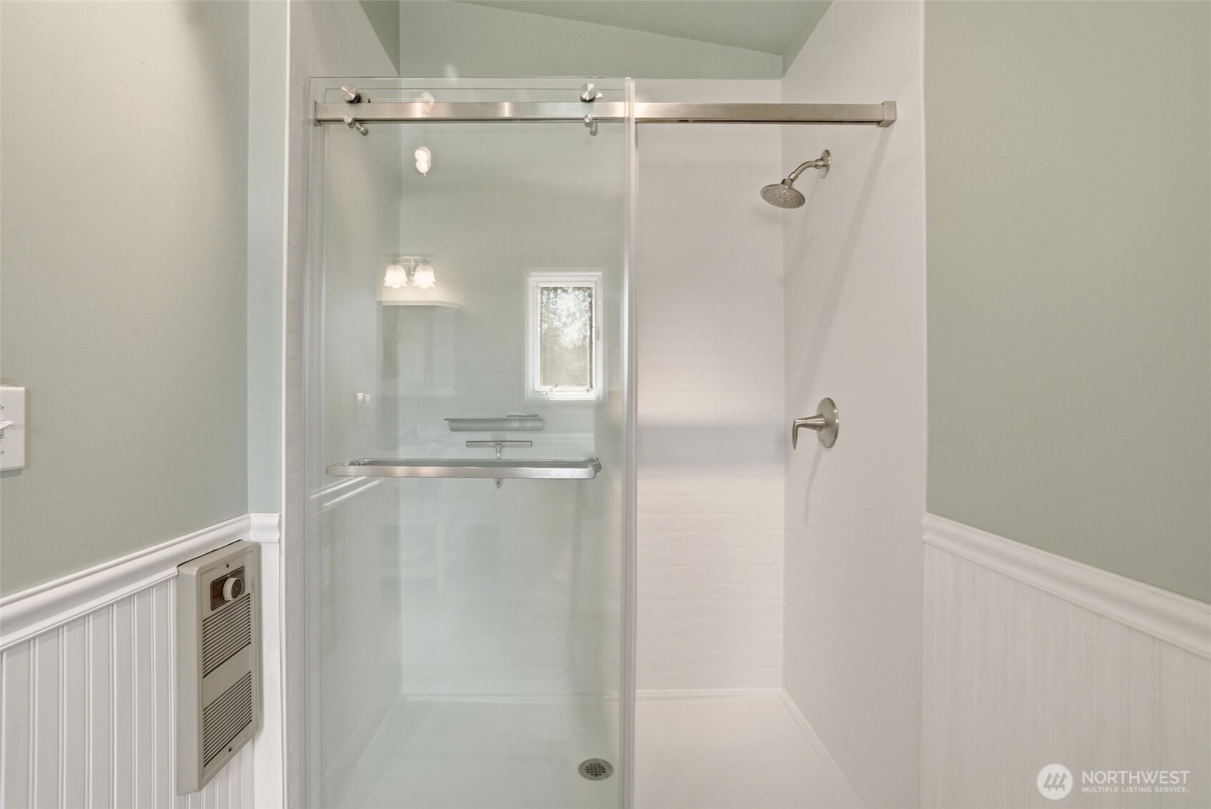 12119 South Spotted Road Cheney, WA 99004 - Photo 21 of 40 a bathroom with a glass shower door