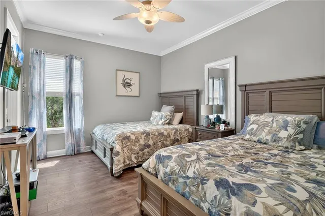a living room with furniture and a walk in closet
