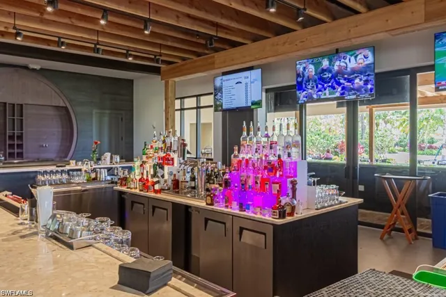 a view of dinning table and chairs in patio