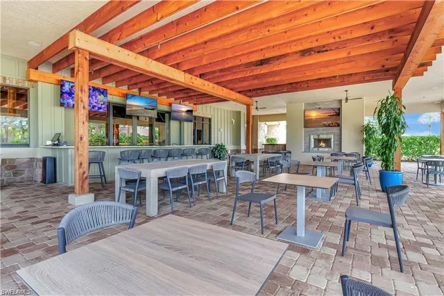 a dining room with chairs and tables