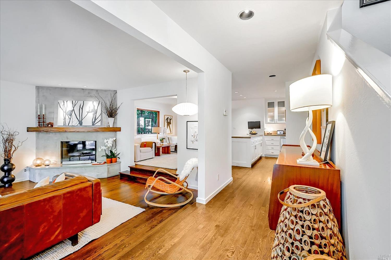 153 West Blithedale Avenue Mill Valley, CA 94941 - Photo 1 of 1 a bedroom with furniture and a wooden floor