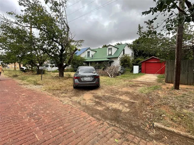 a car parked in front of a house