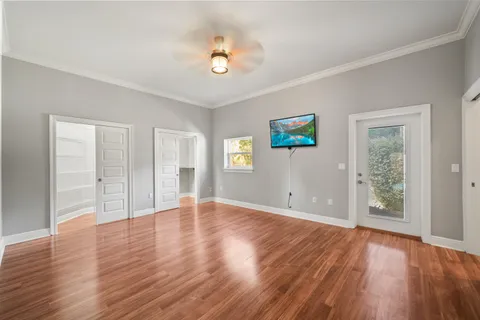 a bathroom with a sink toilet and a mirror