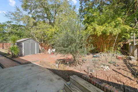 a utility room with sink dryer and washer